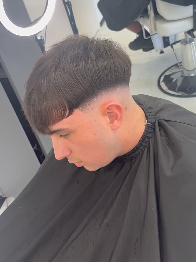 Heavy fringe crop with a fade, by Fin