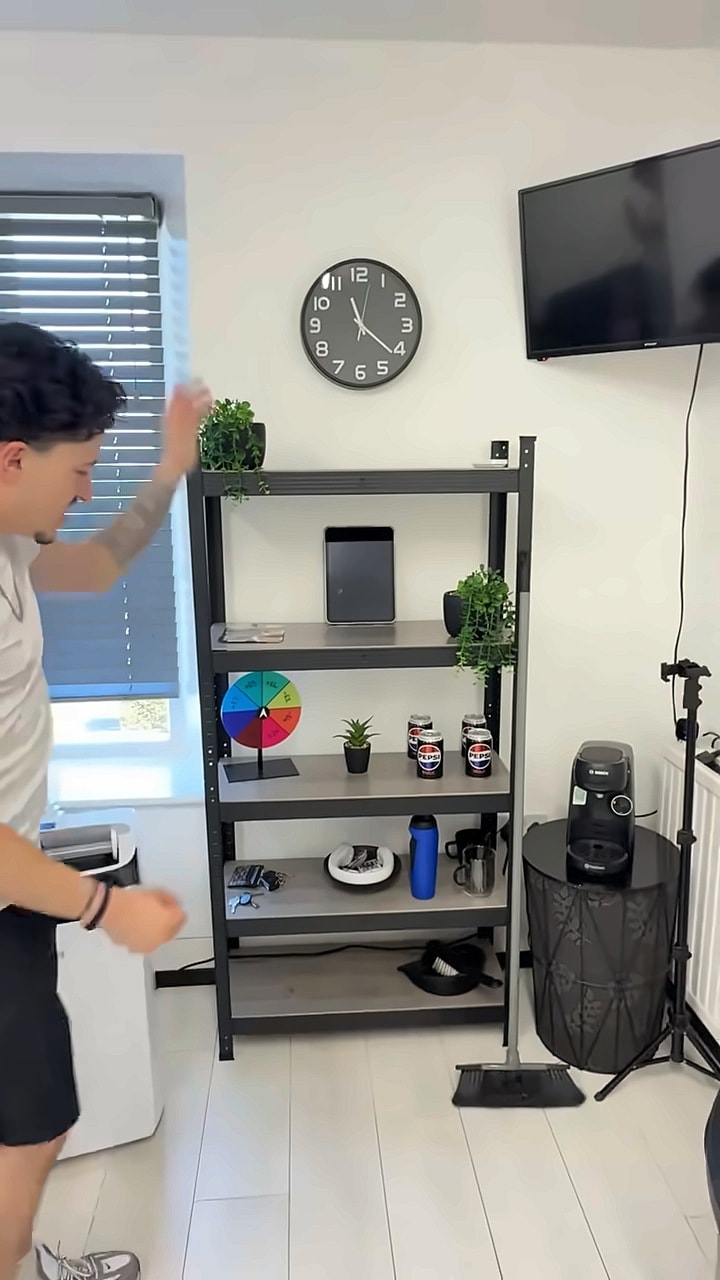 The drinks station and shelves in the studio